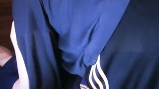 Male doll wears nylon Adidas shorts