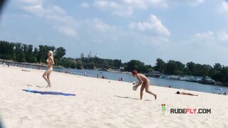 Curvaceous nude beach girl caught by a voyeur on a hidden camera