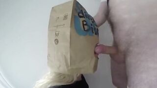 Dirty German girl blowjob with a McDonalds Paper Bag on head