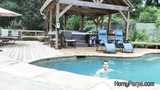 Security guard having fun with trespasser by the pool